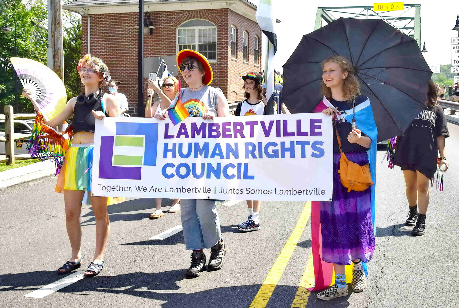 Members of the Lambertville Human Rights Council march in the parade.