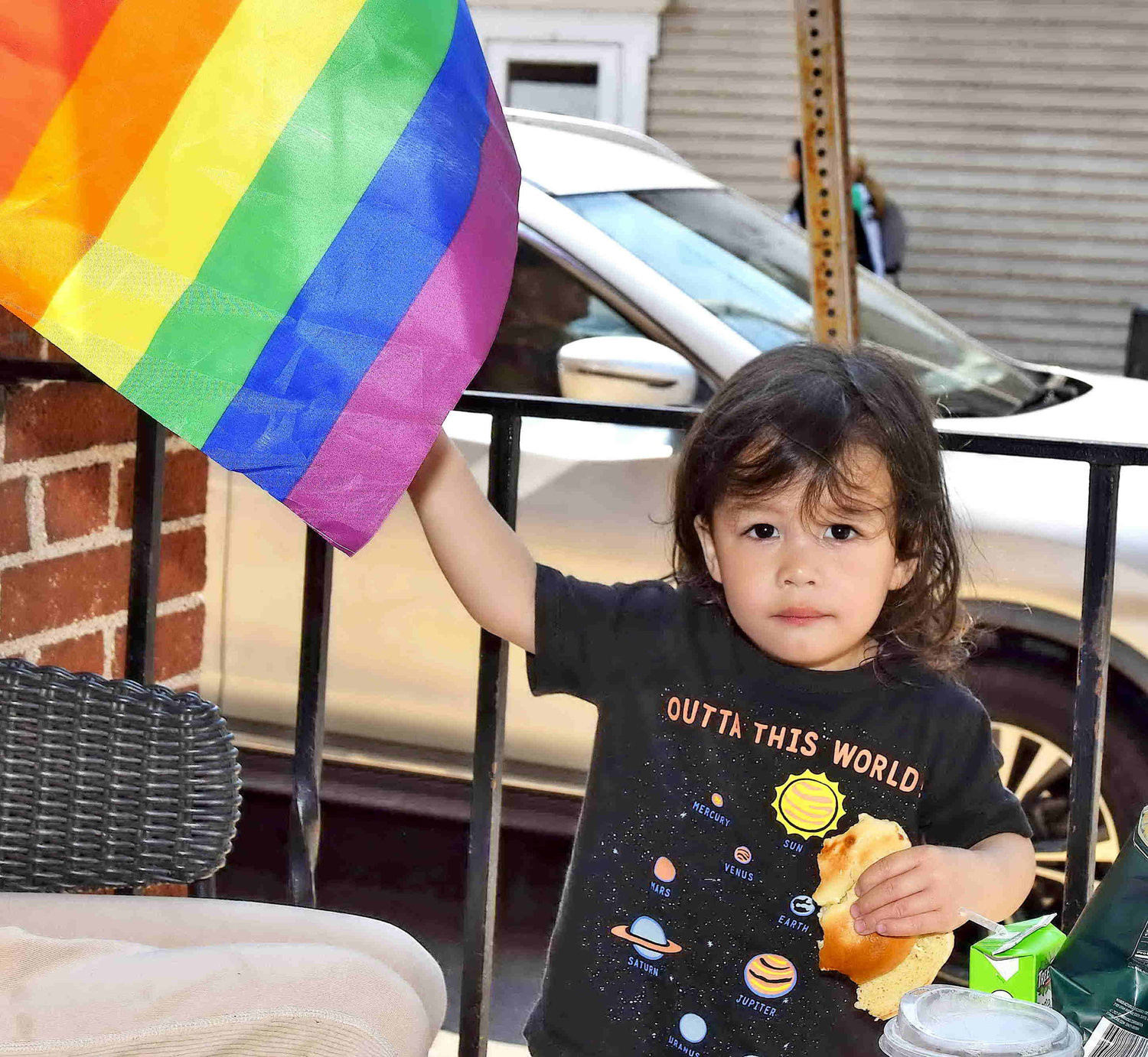 Aiden Li, 2, with his flag.
