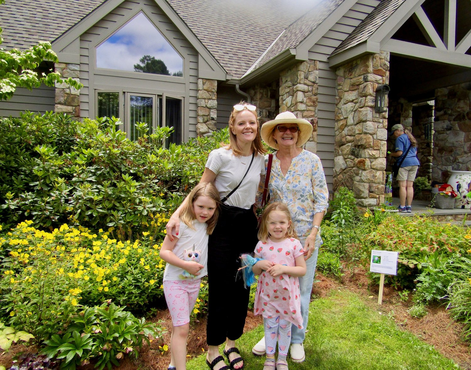 Whitney Proud with Ardith Talbott and daughters Peyton and Callie in the Carota garden.