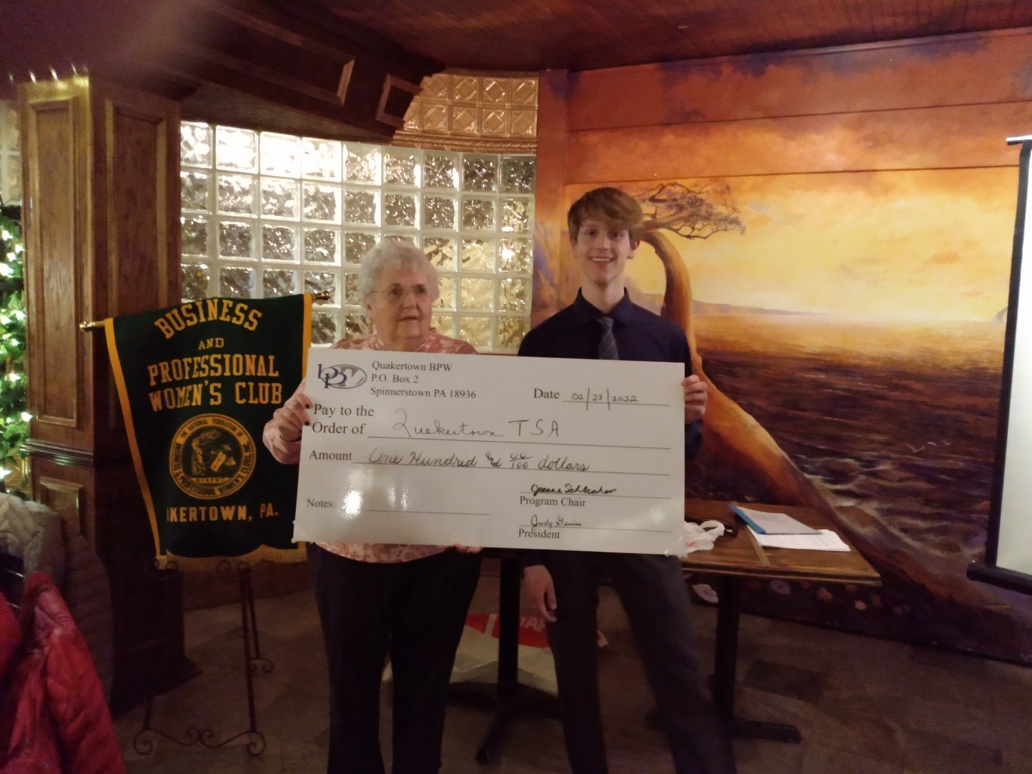 President Judy Guise of the Quakertown Business and Professional Women’s Club presented Lucas Schartz, senior at the Quakertown Community High School, with a check.
