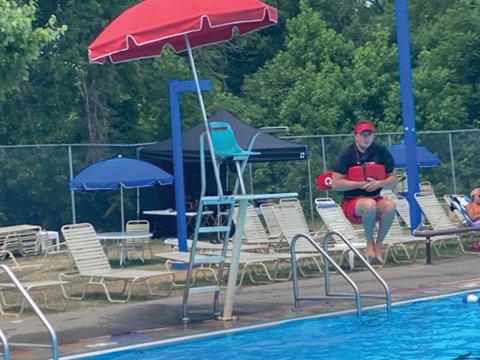 Lower Makefield Township Assistant Pools Manager Josh Cohen demonstrates a proper lifeguard rescue jump.