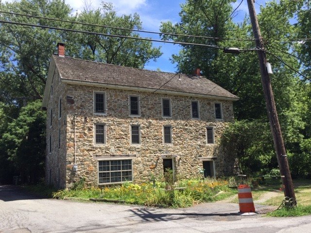 Amy Hollander and her husband, Doug Milne, have restored the 1812 Fines Wool Manufactory, turning it into their home.