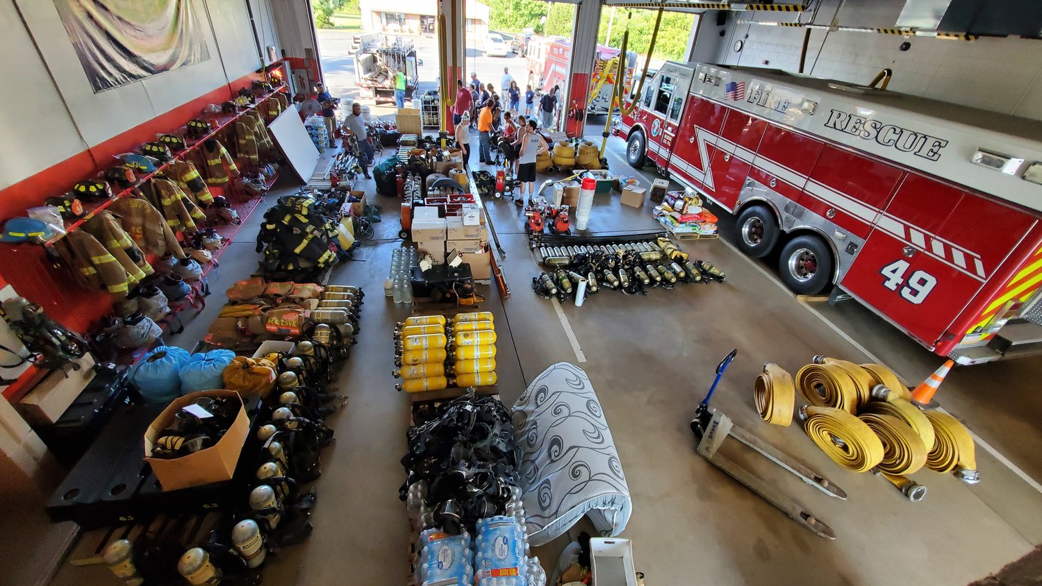 Volunteer firefighters from the Palisades Regional district gathered supplies at the Ottsville Firehouse before the trip to Kentucky to aid fire companies in flooded areas.