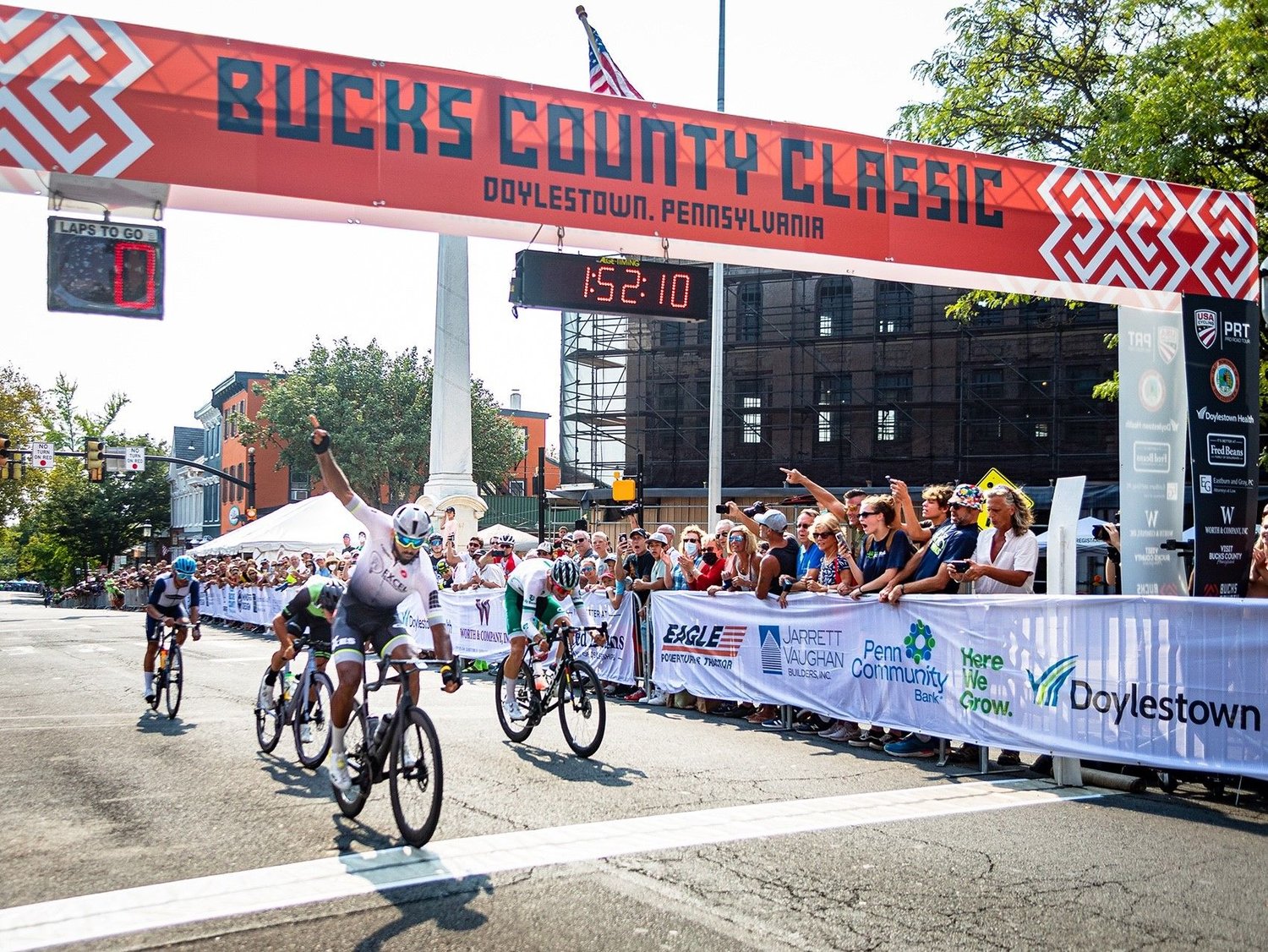 Riders reach the finish line at a previous Bucks County Classic. The bike racing event returns to Doylestown Sept. 11.