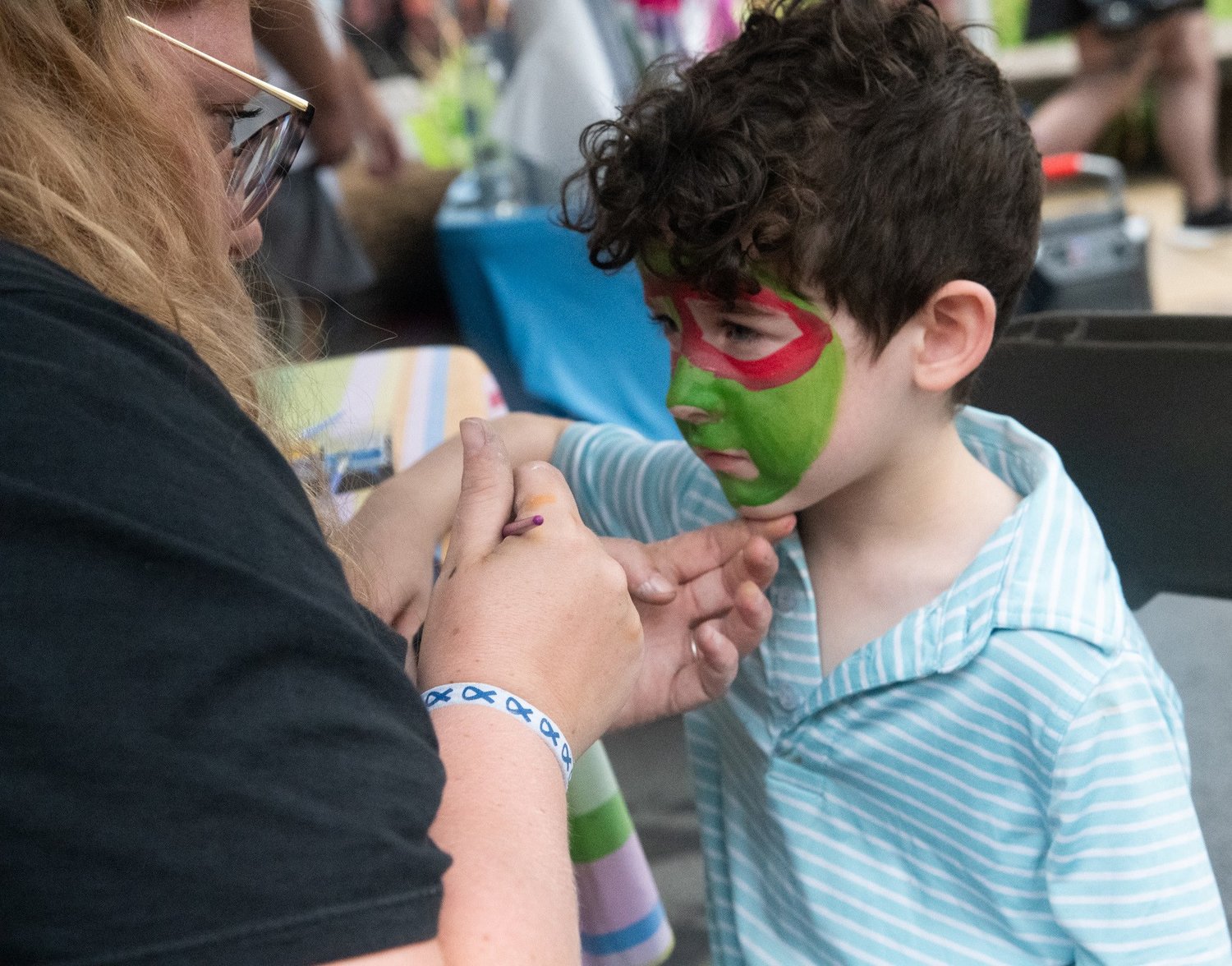 Tommy Hermand, 5, of Doylestown gets his face painted.