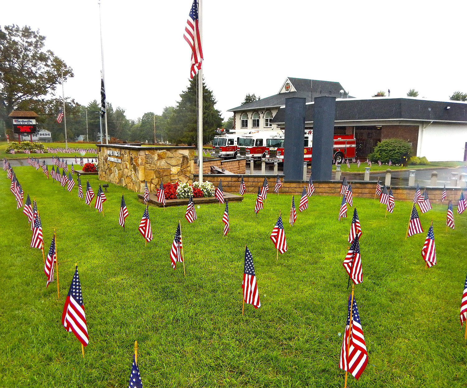 Hartsville Fire Company’s Flag Memorial lines the front lawn.