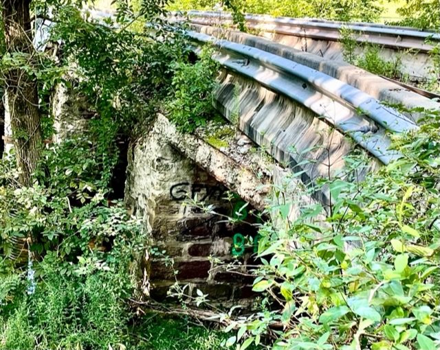 After 10 years of neglect, the foundation of the decaying Headquarters Road bridge is in question.