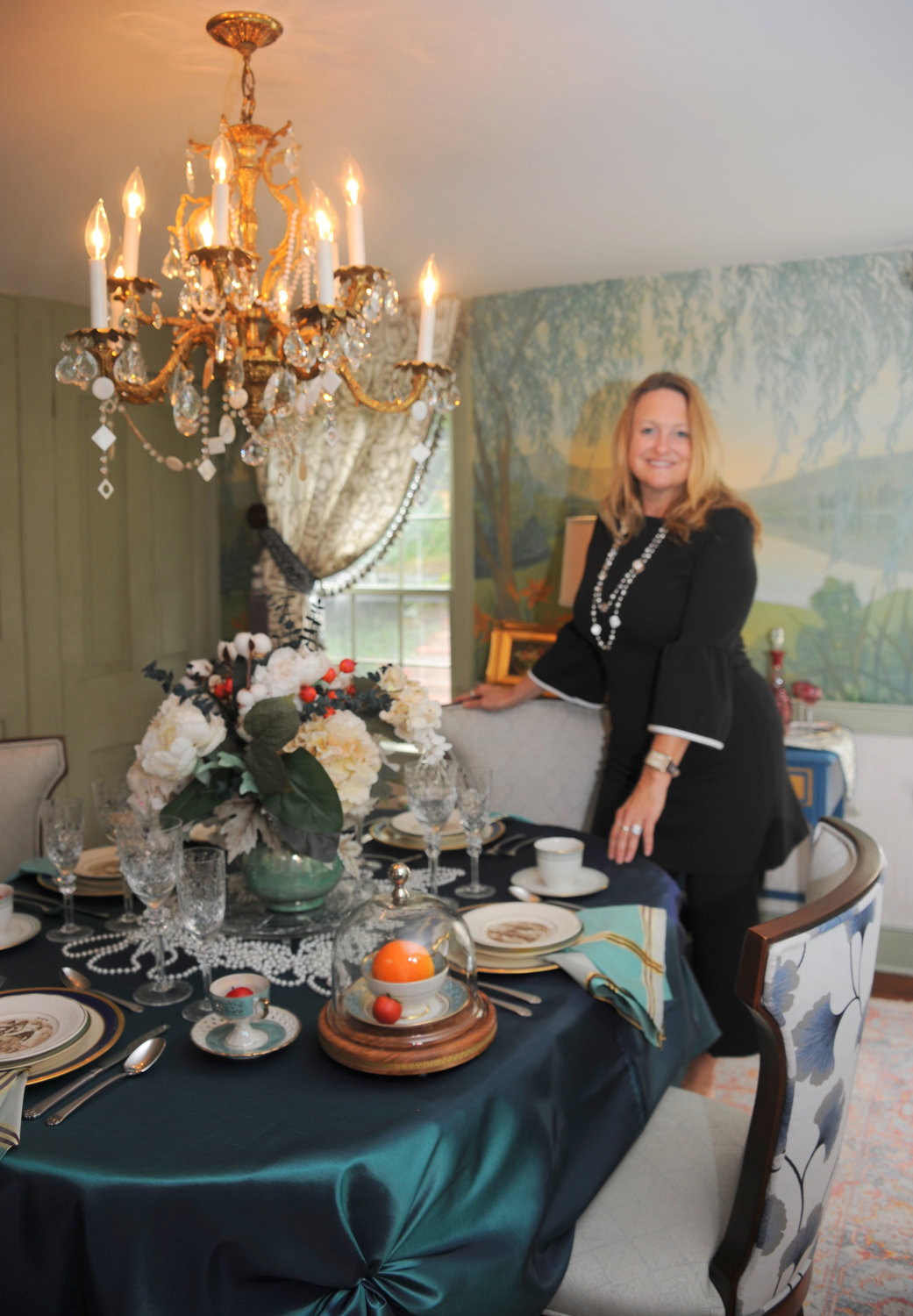 Angela Ast of ABCA Design designed the dining room “Dinner on the Delaware.”
