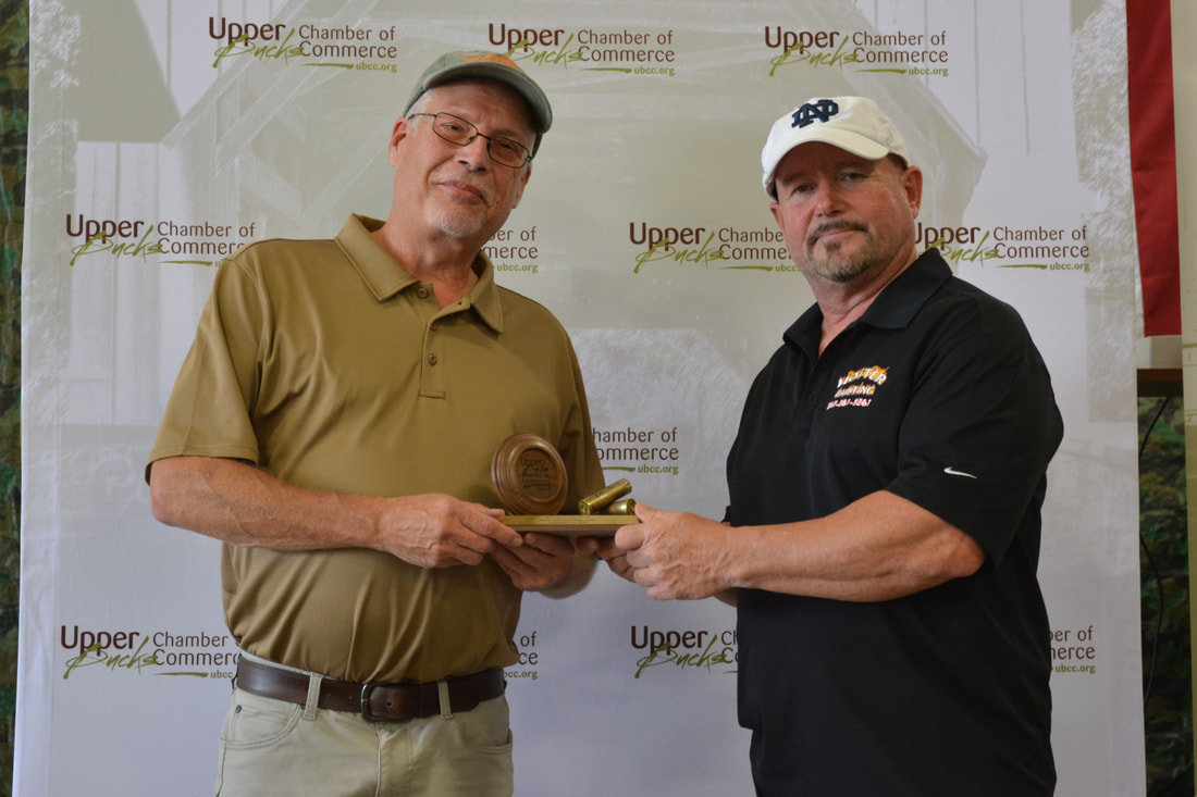 Art Rosenberger is honored for having the men’s highest score at the Clay Shoot.