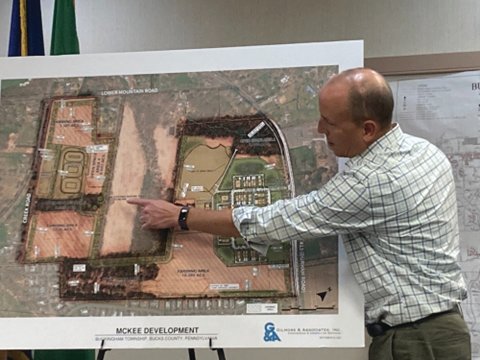 Engineer Ron Monkres points out some elements on The McKee Group’s proposal for 41 homes of various types in Buckingham Township.