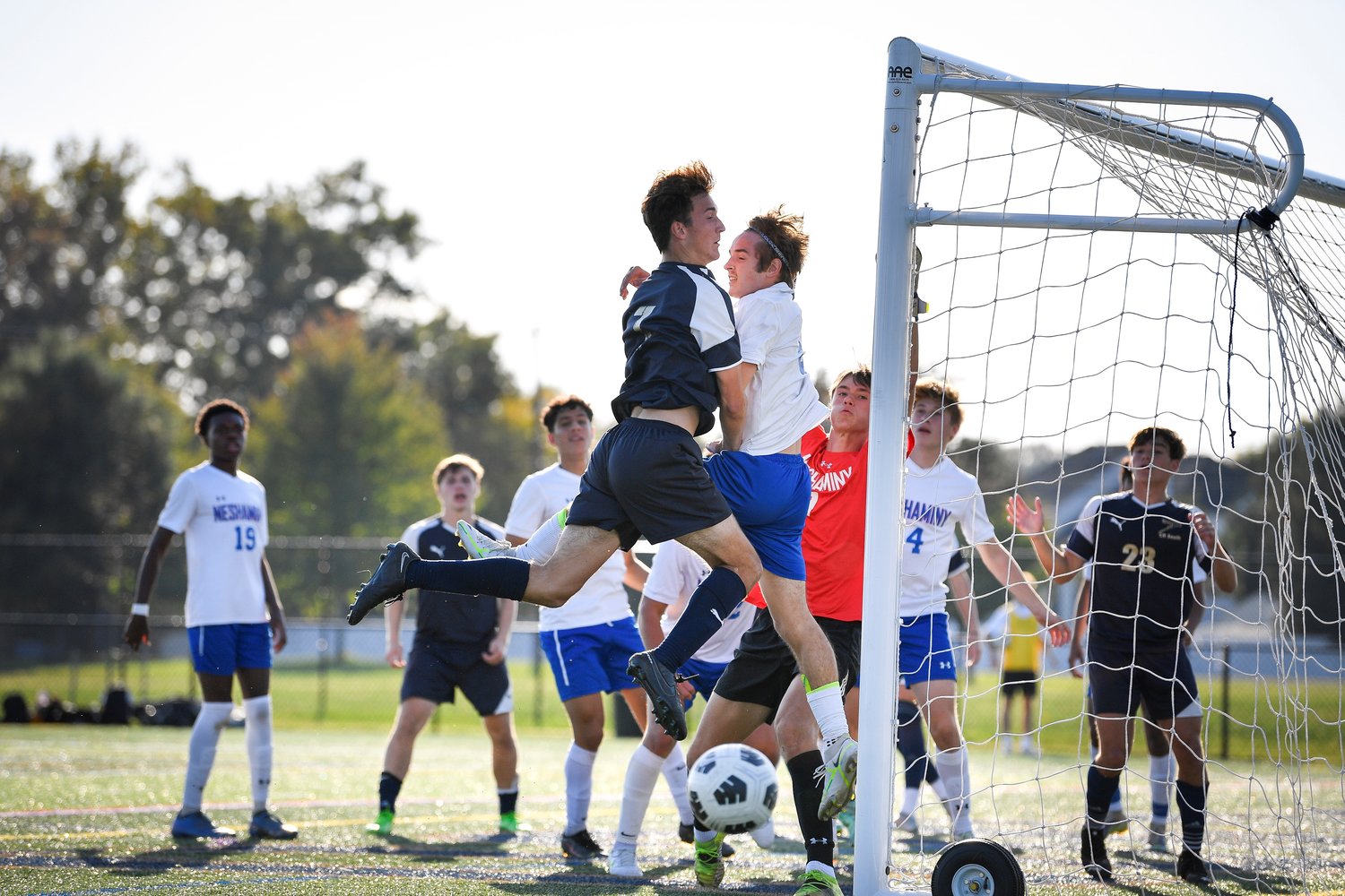 Council Rock South’s Francis Rafferty and Neshaminy’s Chris Valley collide during a corner kick in the front of the net.