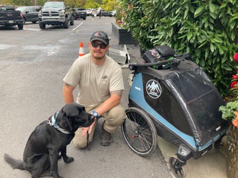 Army veteran Kevin Wilson and his service dog Calvin are walking the 1,300-mile September 11 National Memorial Trail.