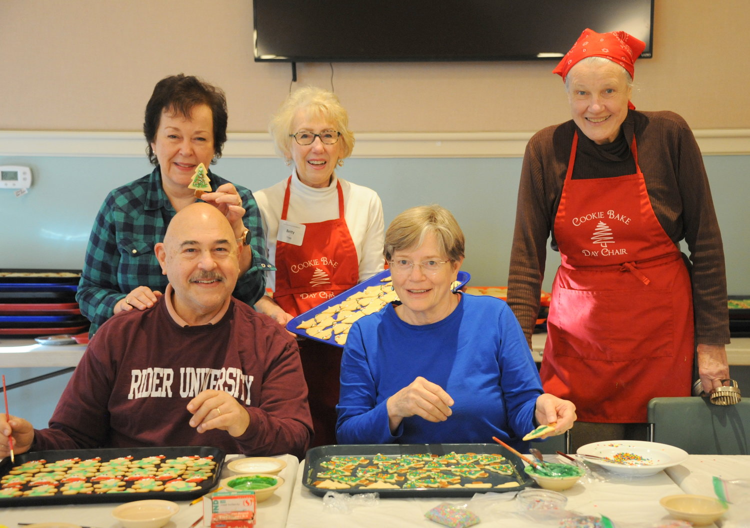 The big kids decorating cookies were Frank Levy, Mary Muth, in front, and Lisa Landley, Betty Stag and Linda
Kenyon in back