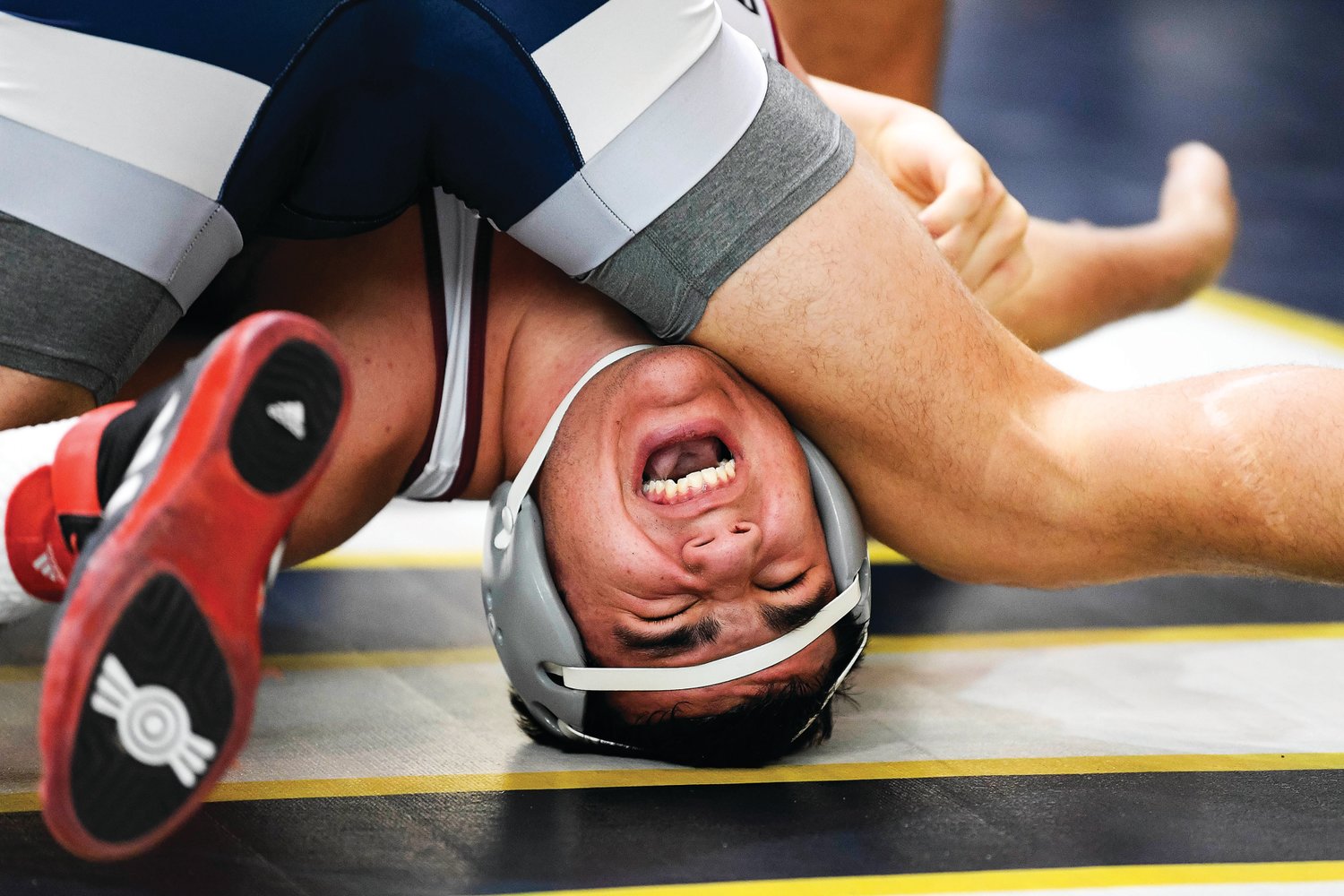 Faith Christian Academy’s Jason Singer tries to break the hold of Nick Wehmeyer of Malvern Prep during a 189-pound match.