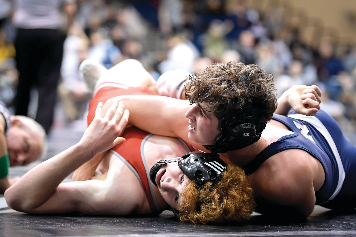 Council Rock North’s Zack Silber (on top) battles St. Joseph Prep’s Charles Kitching in an early 145-pound match. Silber would advance with a 5-2 decision.