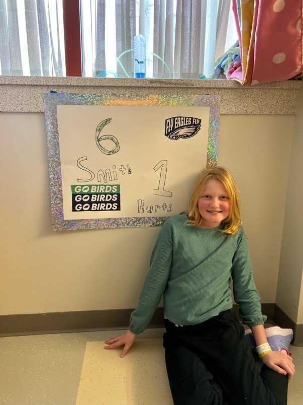 CONTRIBUTED PHOTO
Lily Meade pays tribute to Philadelphia Eagles quarterback Jalen Hurts and wide receiver DeVonta Smith in her hospital room at Children’s Hospital of Philadelphia, where she spent the Eagles’ 2023 NFC Championship run.