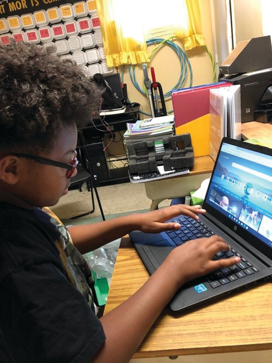 One of three laptop computers purchased by BCHG with VIA funding provides children with an important educational resource.