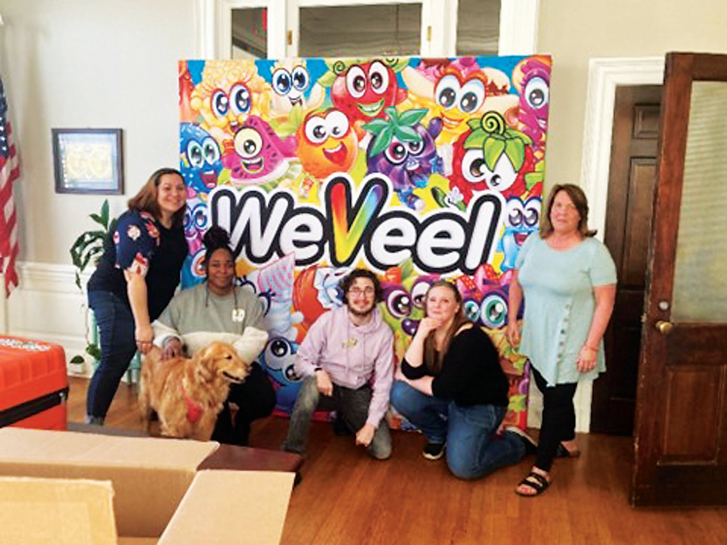 Some of the staff at WeVeel Toys & Stationery at their Morrisville Borough headquarters are, from left, Senior Accounts Manager Sharon Ward, Senior Operations Specialist Dymonique McCleese and office dog Daisy, Junior Operations Specialist Brandon Holzhauer, Creative Director Amy Houser and Accounts Manager Vicki Petroski.