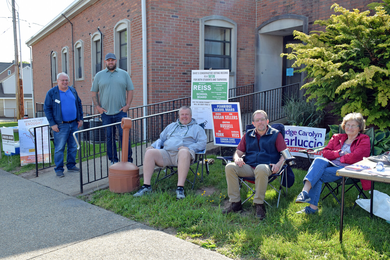 Both party poll representatives outside the Perkasie firehouse.