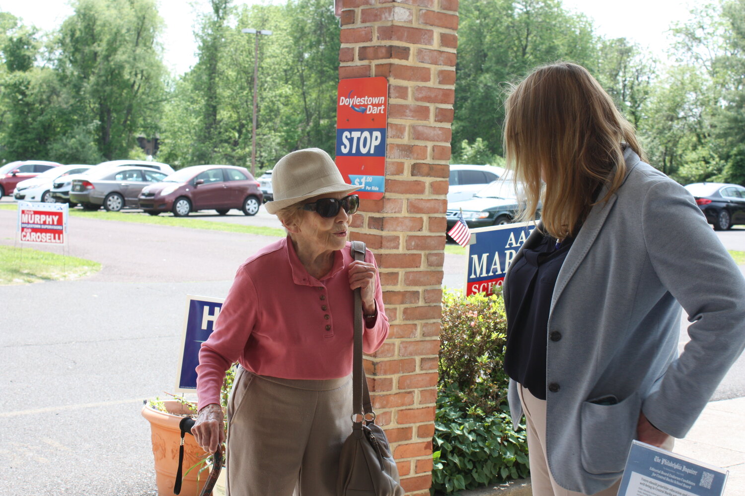 Doylestown Township resident Jean Rutherford, 100, left, talks to Jennifer Herring, a Doylestown Supervisor running for reelection, outside the Doylestown Township 5 polling place at the Doylestown Senior Center.