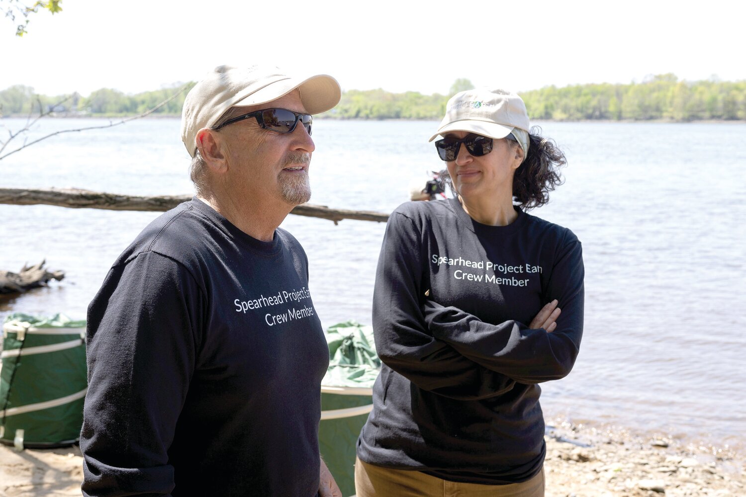 Henry Matthews, a regular volunteer for Spearhead Project Earth, and Patricia Burguete, The Spearhead Group’s global head of sustainability, oversee Earth Day volunteer cleanup efforts on Burlington Island.