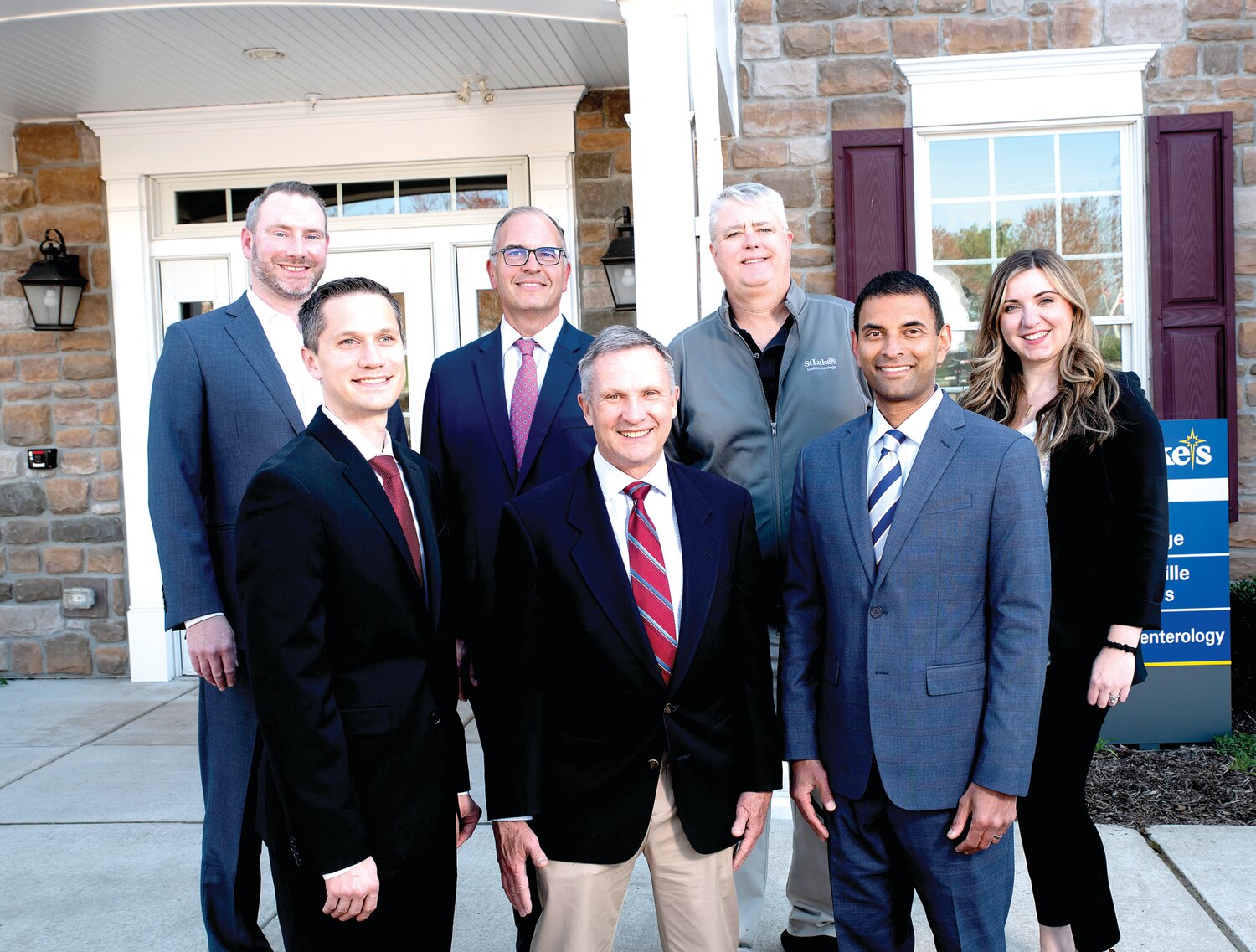 At ribbon cutting for the new St. Luke’s Buxmont Gastroenterology office in Harleysville are: back row, Dr. Christopher Hibbard, Dennis Pflieger, Dr. Michael Cassidy, Sarah Halpin; front row: Scott Siegfried, Dr. Jerome Burke and Dr. Noel Martins.