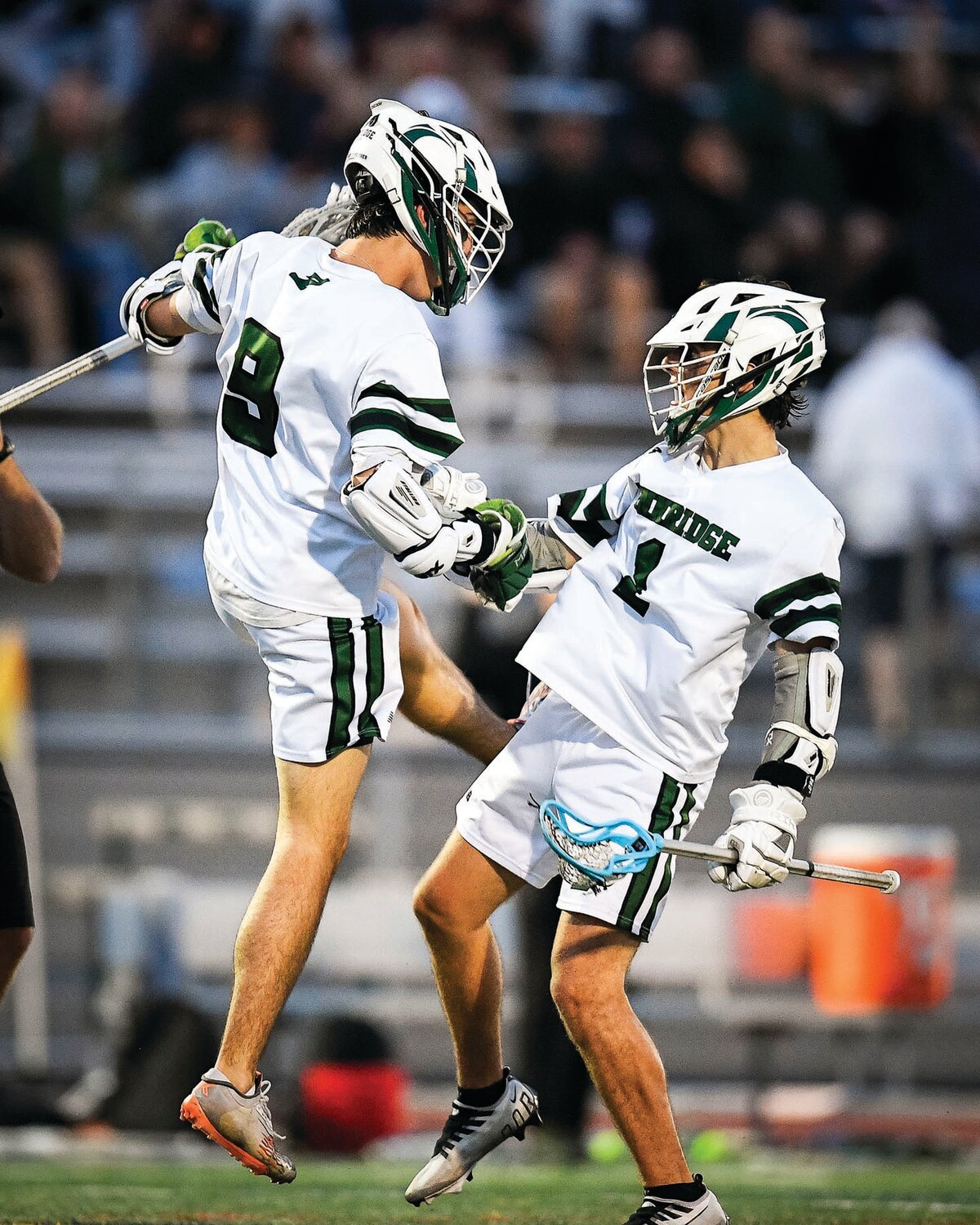 Pennridge’s Ryan Carickhoff and Levi Souder celebrate a goal, which tied the game at 9.