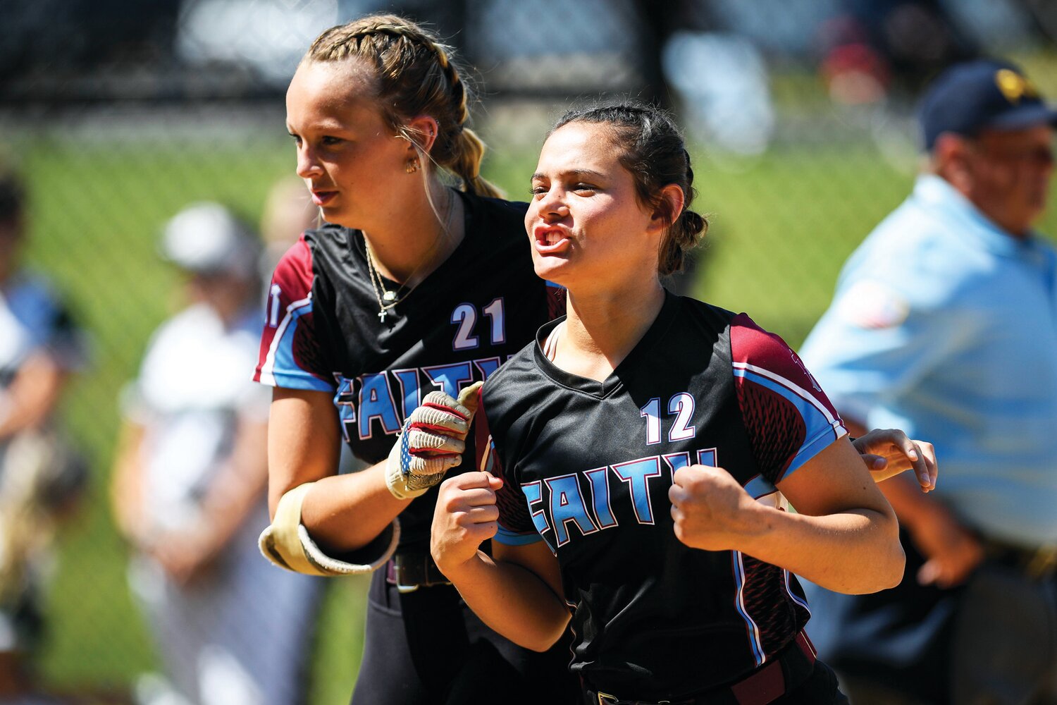 Faith Christian team captains Kamryn Pepkowski, left, and Elana Ault pumped up before the start of the game.