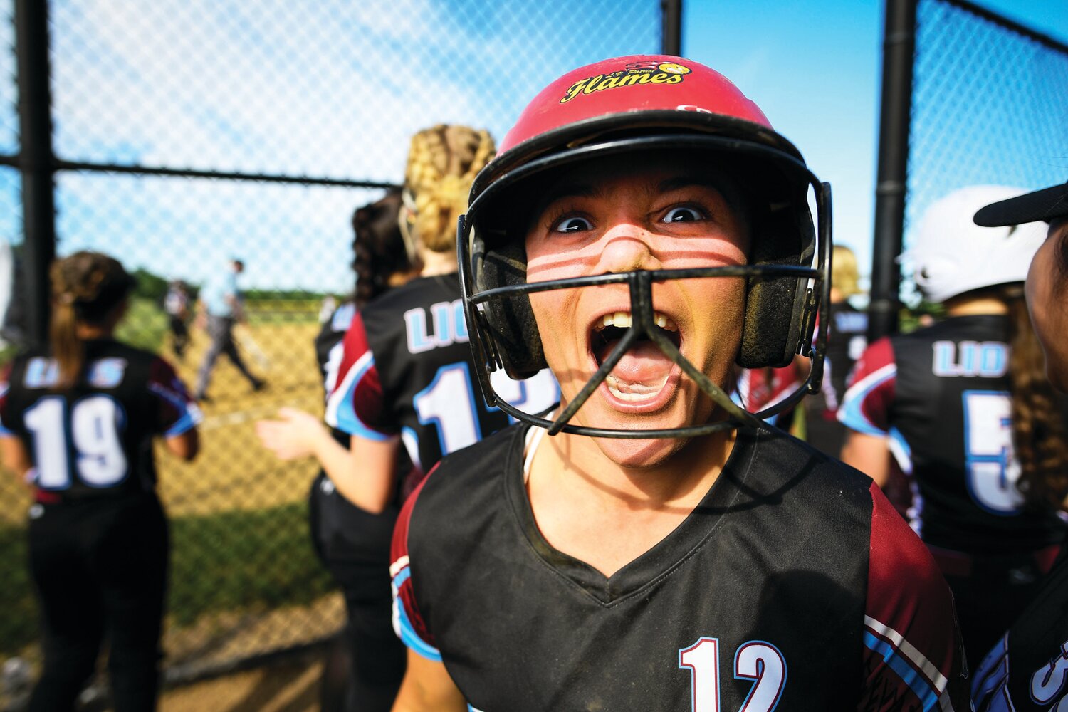 Faith Christian’s Elana Ault after scoring to cut the Dock lead to one at 7-6 in the top of the seventh inning.