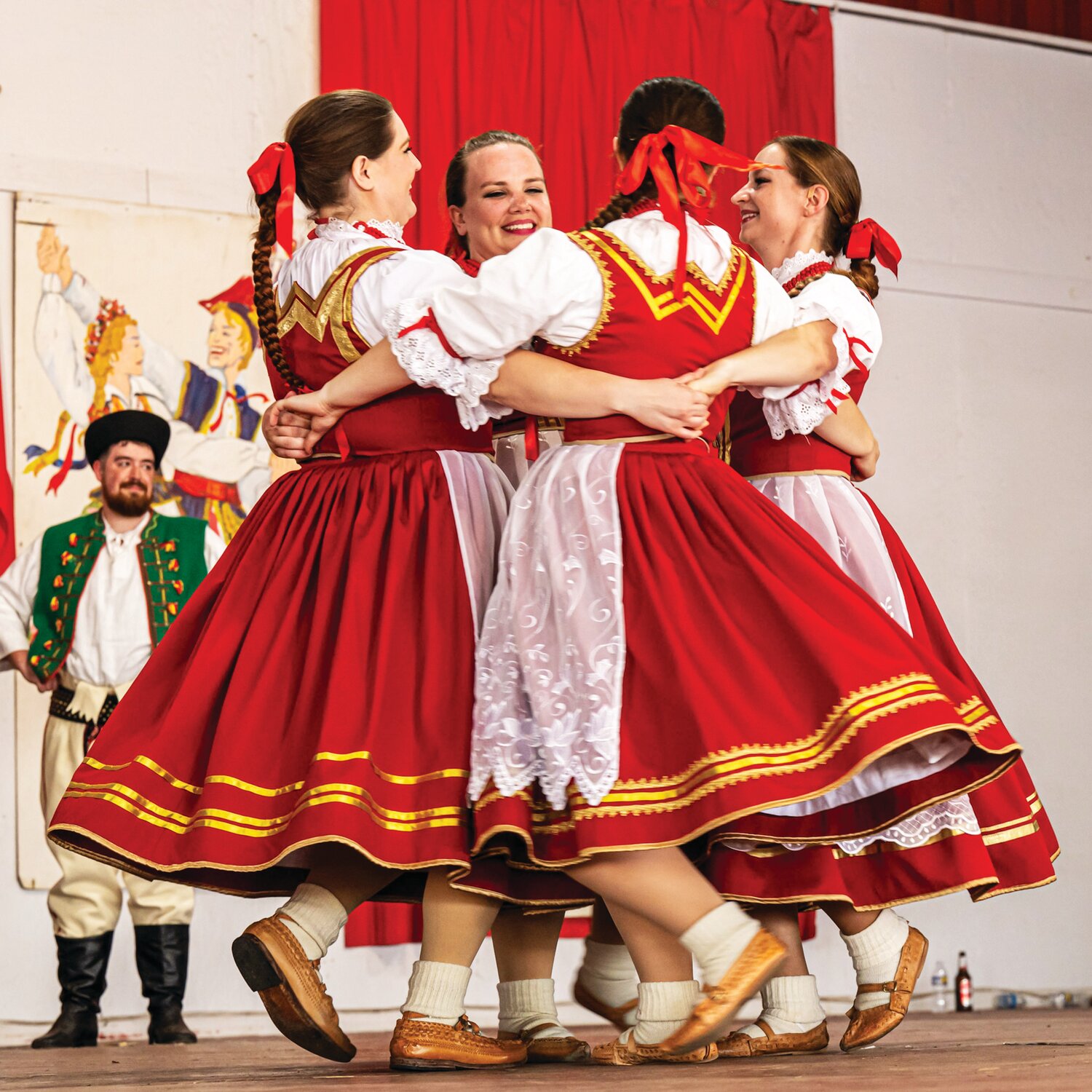 Polish folk dancers perform on stage during the Polish American Family Festival & Country Fair.