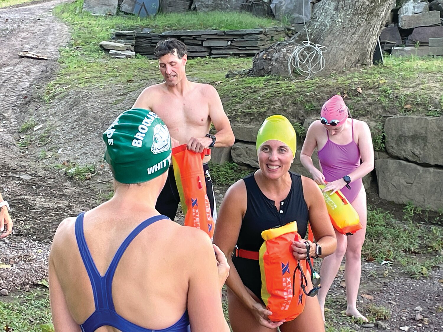 About 5 miles north of New Hope, Julie Titcomb Wittemore, Kevin McKale, Kristi Symchik and Abby Silberman look forward to their weekly swim in the Delaware River.