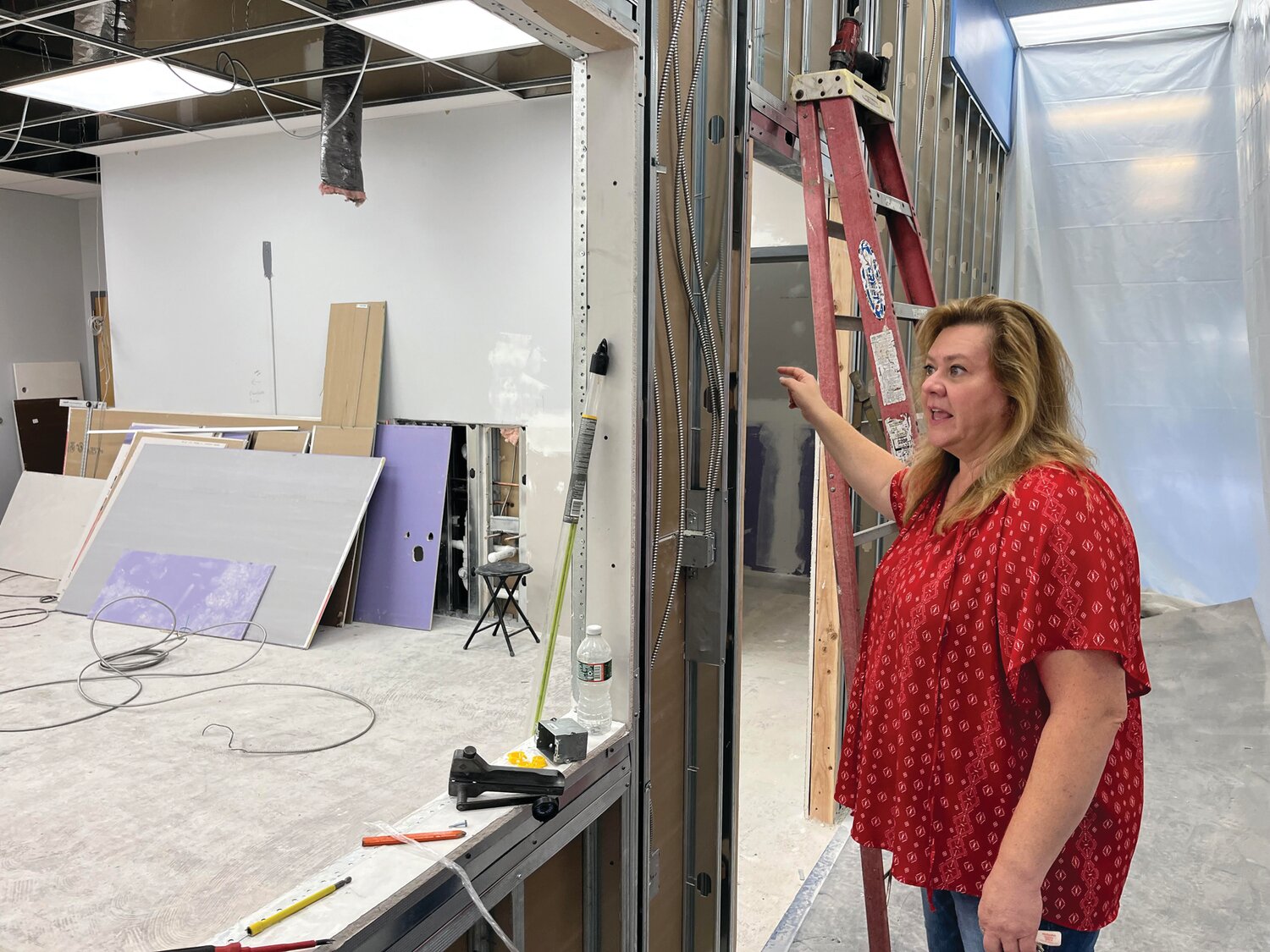 Karin Smith, senior director of Child Care for YMCA of Bucks and Hunterdon Counties, describes the child care renovations being completed at the Round Valley branch in Annandale, N.J.