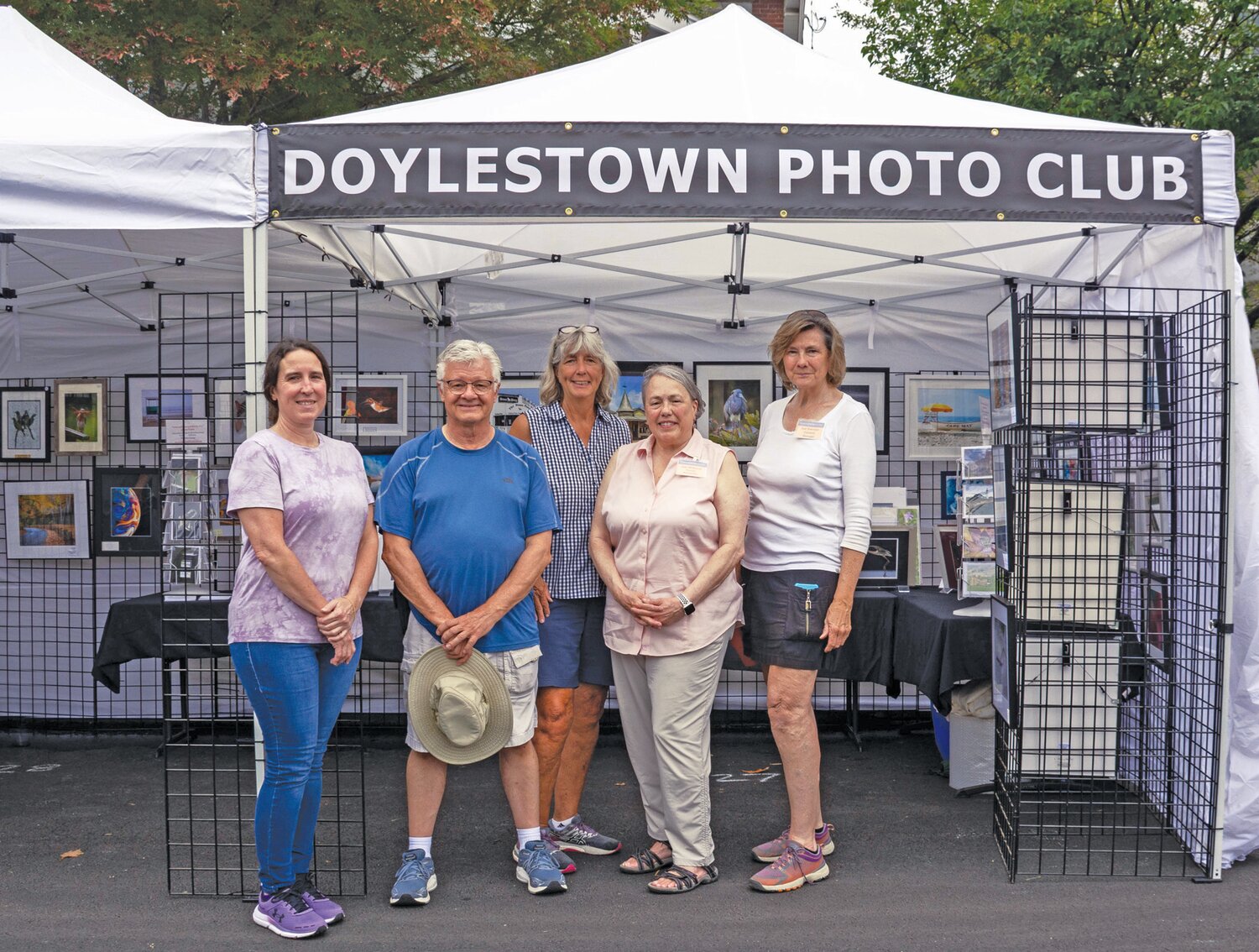 Amy Shaffer, Michael Tontoni, Cathy Sherman, Jean McKenna and Sue Sherman represent the Doylestown Photo Club at the Doylestown Arts Festival Saturday.