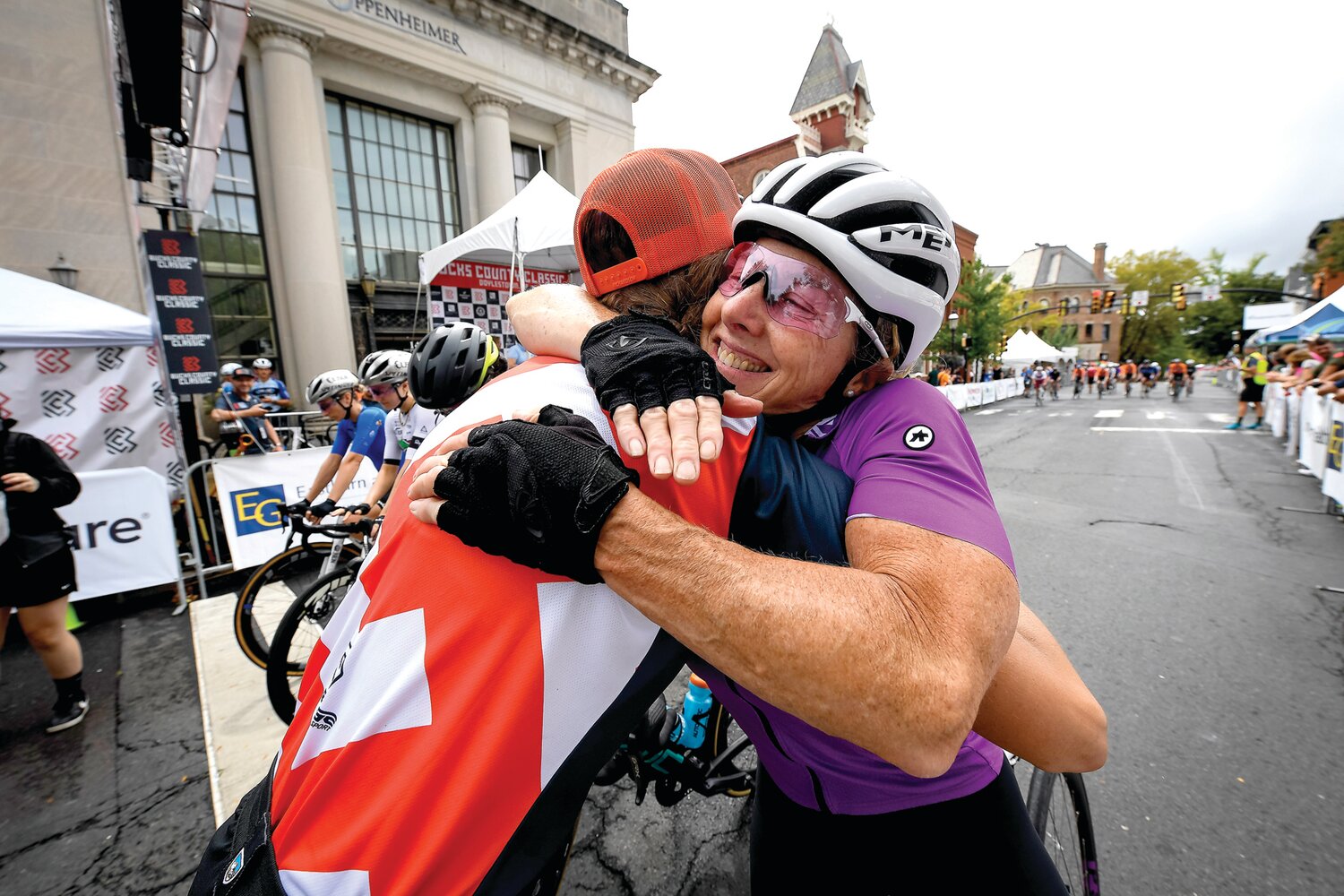 Cycling legend Laura Van Gilder gets a hug at the start line from race director Laura Reppert. Van Gilder is a Pocono native and is widely considered one of the best women’s cyclist in American history.