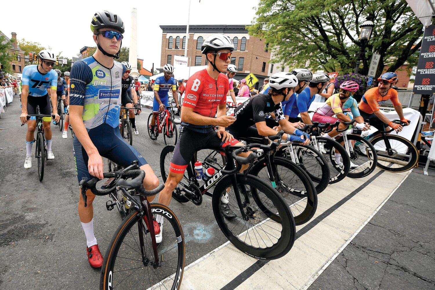 Central Bucks West grad and local Doylestown native Sam Smith of the Bike Works p/b Fred Beans club gets a call up before the start of the men’s pro 1/2 race. A “call up” is when they introduce prominent riders, favorites and past winners to the start line.