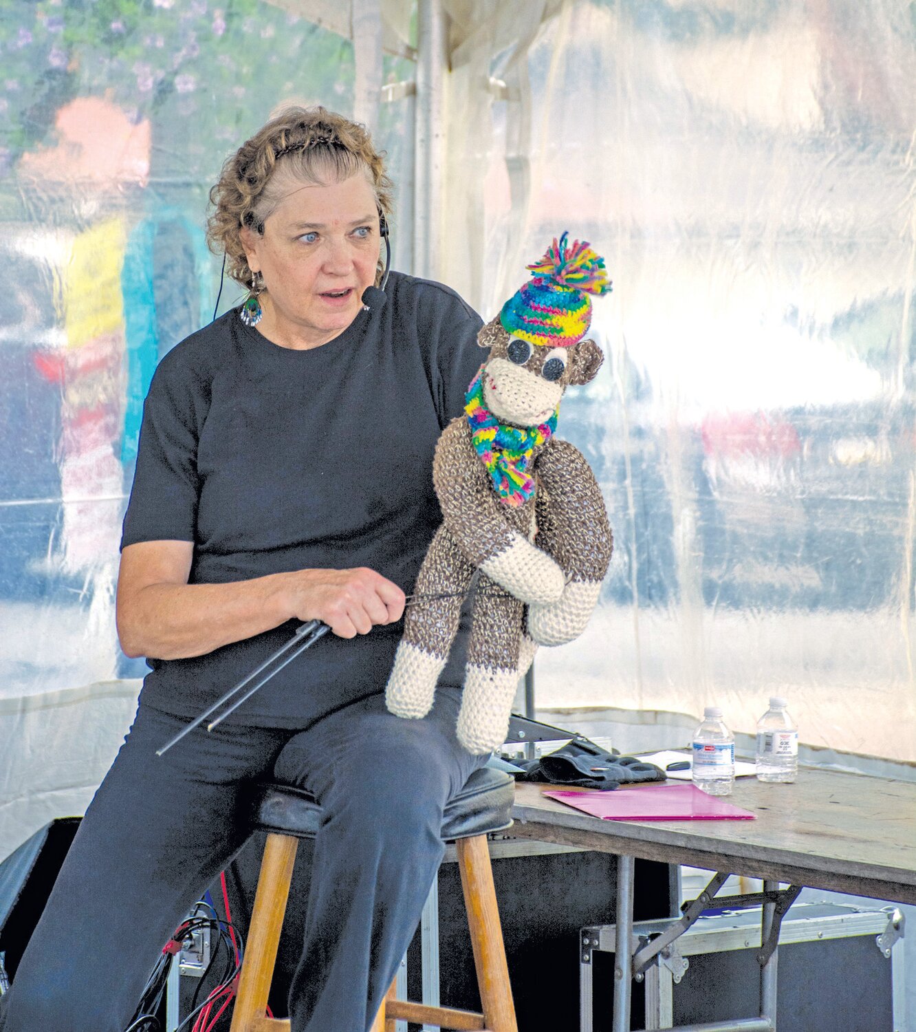 Marianne Tucker of Tucker’s Tales Puppet Theatre in Montgomery County, performs for festival goers Saturday.